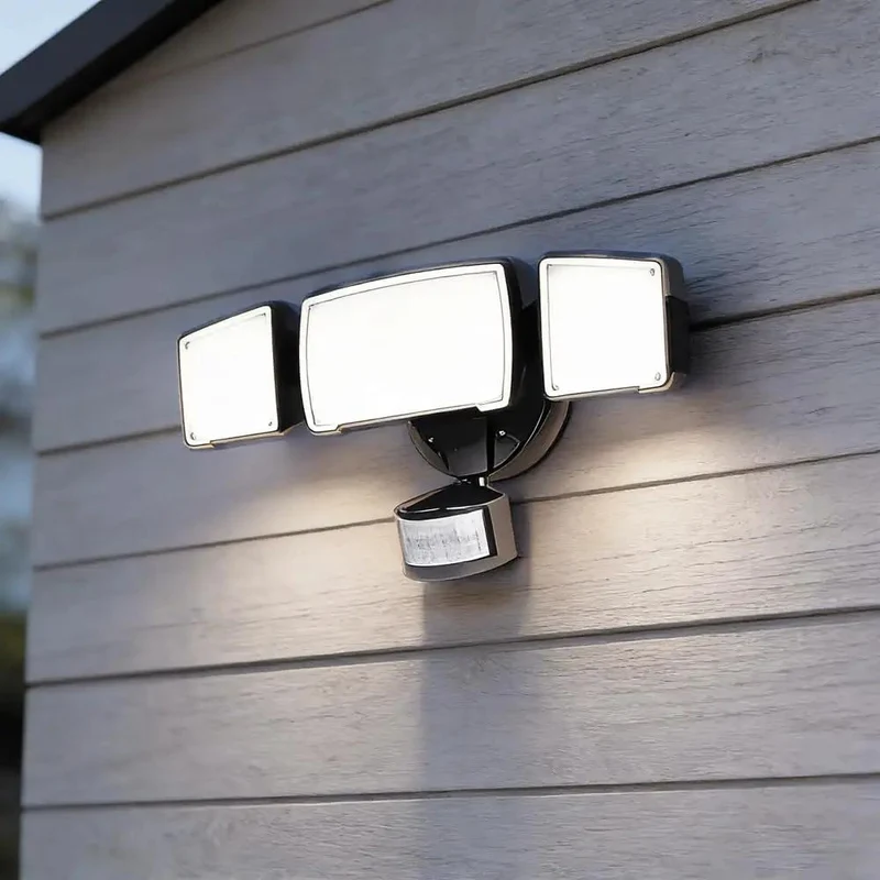 Reliable Badass Tri Head Motion Sensor LED Security Flood Light 5500 Lumen Adjustable Porch Spotlight Daylight Warm Bright White Settings Sleek Black Weatherproof Outdoor Mount