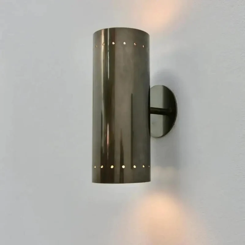 Badass Handcrafted Perforated Brass Wall Sconce With Sleek Cylinder Body And Tight Geometric Detailing For Killer Ambient Glow And Fresh Living Room Decor Swaps