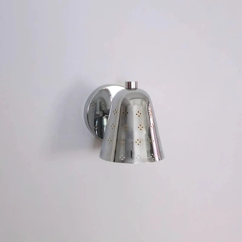 Handcrafted Solid Brass Wall Sconce Sporting A Slick Mid Century Cone Shape With Perforated Metal Accents Casting Killer Shadow Effects For Top Tier Ambient Lighting Vibes