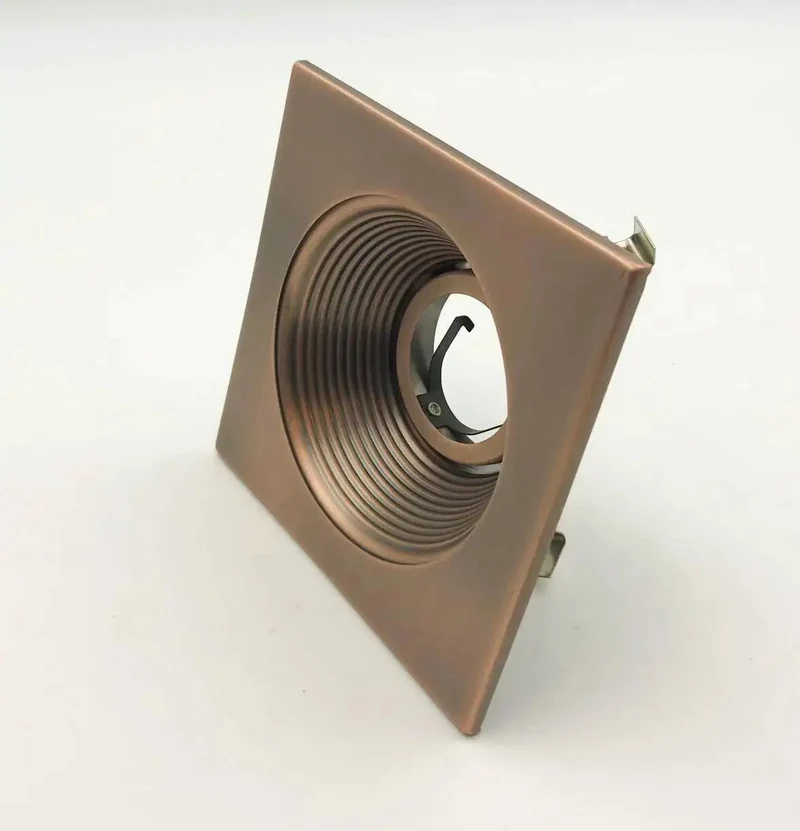 4 Inch Recessed Can Light With Square Trim And Antique Bronze Finish Adjustable 30 Degree GU10 Compatible 120 Volt Low Voltage Smooth Stepped Baffle Knockout Finish Straight Shot Install