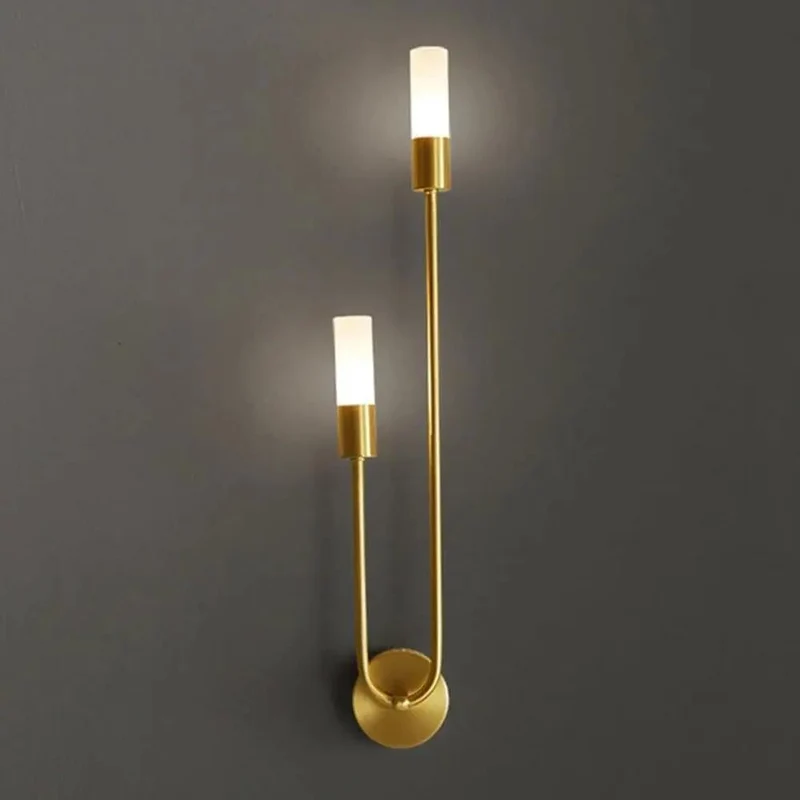 Modern Wall Sconce Featuring Smooth Linear Curves For Totally Fresh Up Down Ambient Lighting Crafted In Premium Brushed Gold Finish To Deliver Major Contemporary Vibes For Bedroom Or Entryway Walls