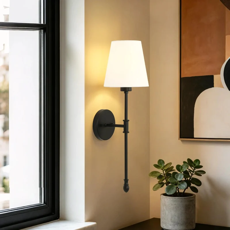 Sleek Matte Black Wall Sconce With Tall Stem And Soft White Linen Shade Modern Indoor Lighting That Hits Different Clean Architectural Vibes For Bedrooms And Hallways Today