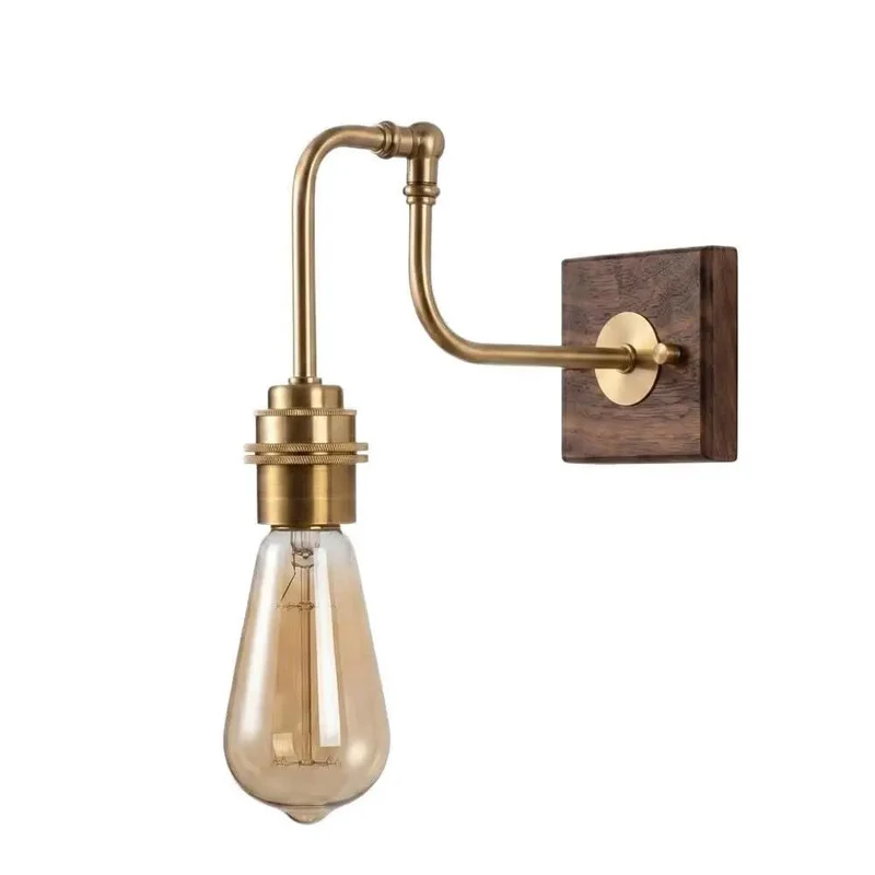 Vintage Brass Wall Sconce Featuring An Adjustable Swing Arm And Solid Walnut Wood Base. Super Chic Industrial Light Fixture That Pumps Out Hella Cozy Ambiance For Your Walls. Badass Decor Piece.