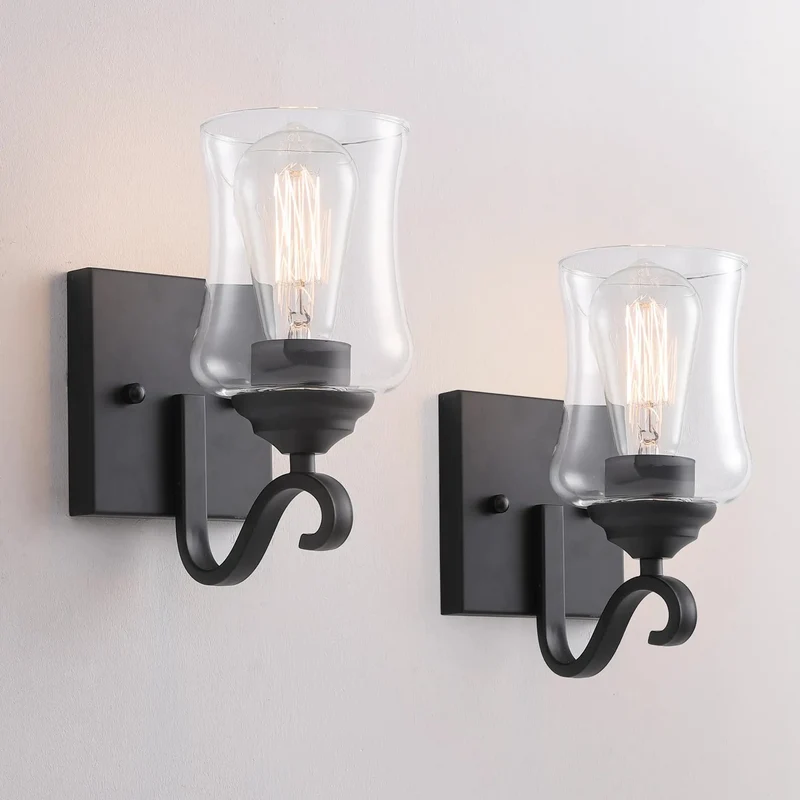 Set Of Two Black Wall Sconces Featuring Clear Glass Shade And Hard Wired E26 Socket Sharp Bath Lighting Duo For Hallway Or Stairwell Supporting Quick Up Or Down Facing Install That Brings Clean Vibes To Any Space