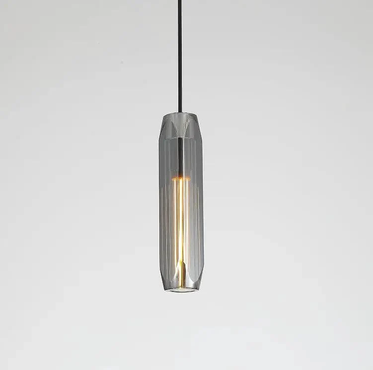 No Fuss Modern Pendant Light Featuring Easy Length Adjust And Hella Cool Smoke Gray Crystal Shade With Polished Brass Accents For Kitchen Islands Dining Rooms And Bar Counters