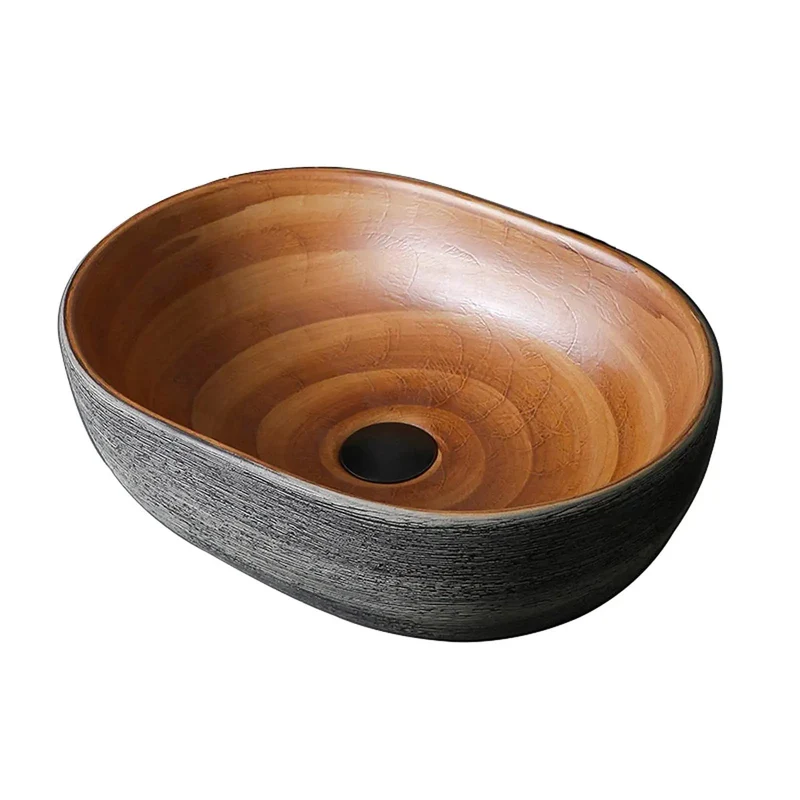 Smooth Glazed Ceramic Countertop Bathroom Sink With Graceful Oval Vessel Shape, Hand Carved Curves That Bring Next Level Vanity Vibes, Heavy Duty Construction Built To Handle Daily Use Without Skipping A Beat, Includes Matched Copper Hardware And