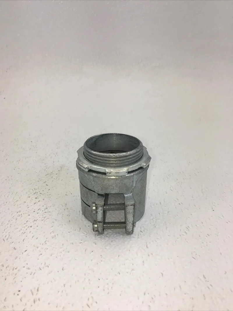 Built Tough One And A Half Inch Squeeze Connector For Electrical Conduit Featuring A Snug Grip Setup And Zero Fuss Install Designed For Electricians Who Want Rock Solid Metal Pipe Joints For Every Single Project On Site